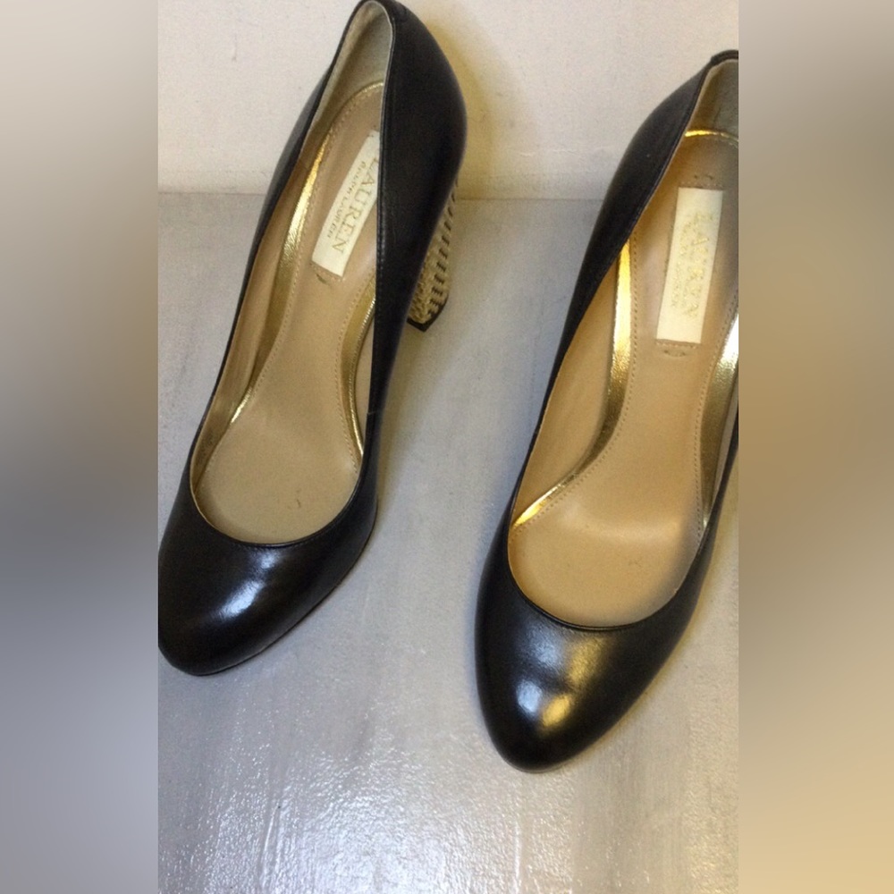 Ralph Lauren black heels with a gold design on the heels